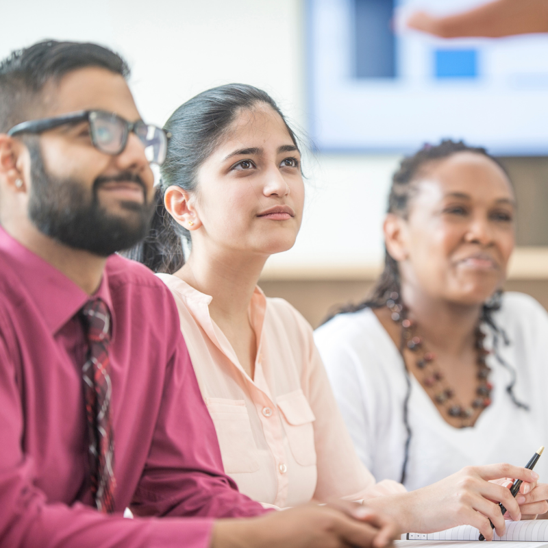 Emma Khan working with an employer on training plans